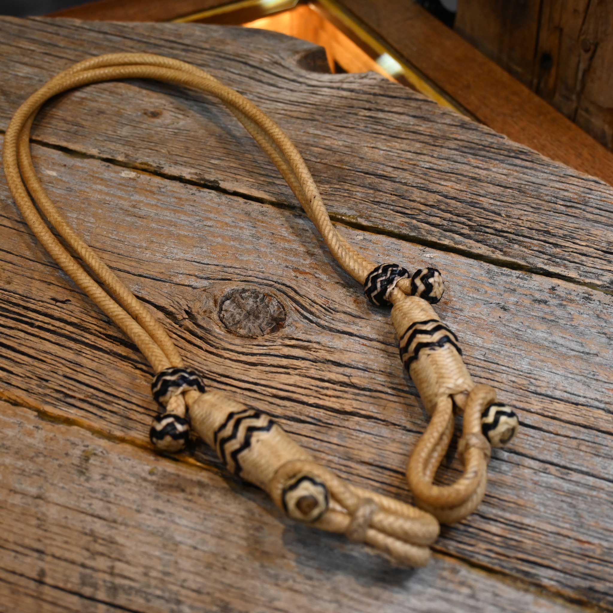 Braided Rawhide Bosal Hanger w/ Black Accents
