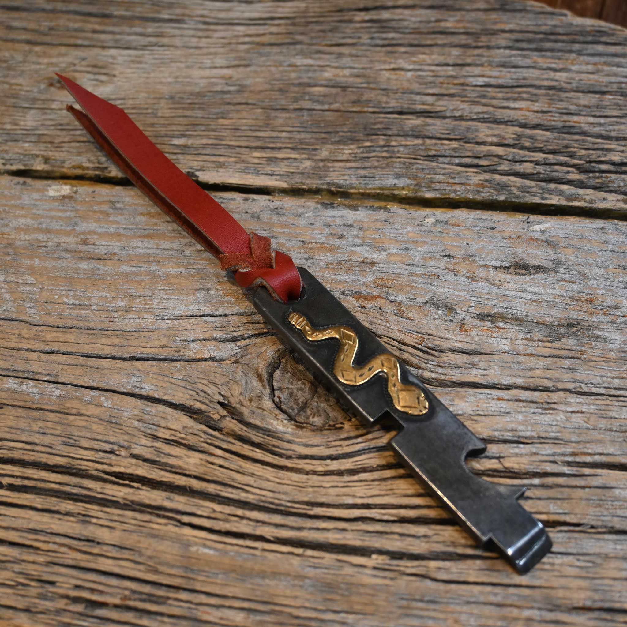 D. Conway Brass Snake Cowboy Tool 254