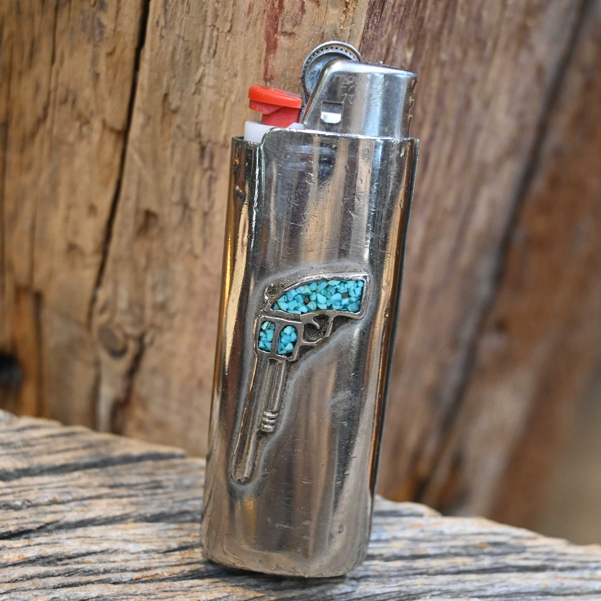 Nickel Bic Lighter cover w/a Turqouise Pistol Motiff